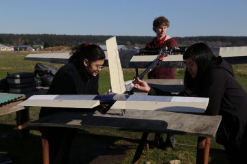 Team members preparing "Stingray" for a test flight